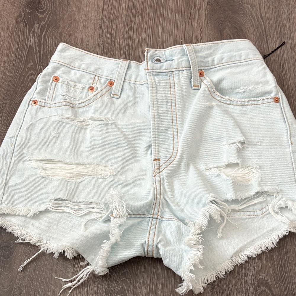 Distressed Light Blue Denim Shorts Levi’s